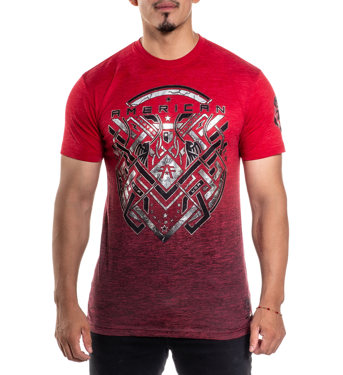 Red t-shirt with graphic design and 'American' text worn by a person on a white background