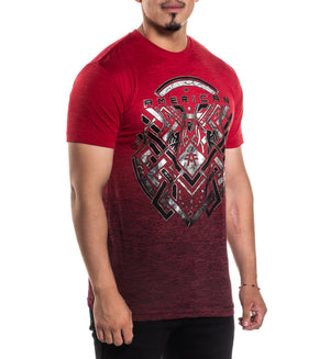 Man wearing a red t-shirt with a graphic design on a white background