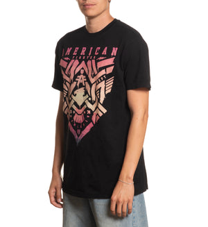 Person wearing a black t-shirt with a graphic design on a white background