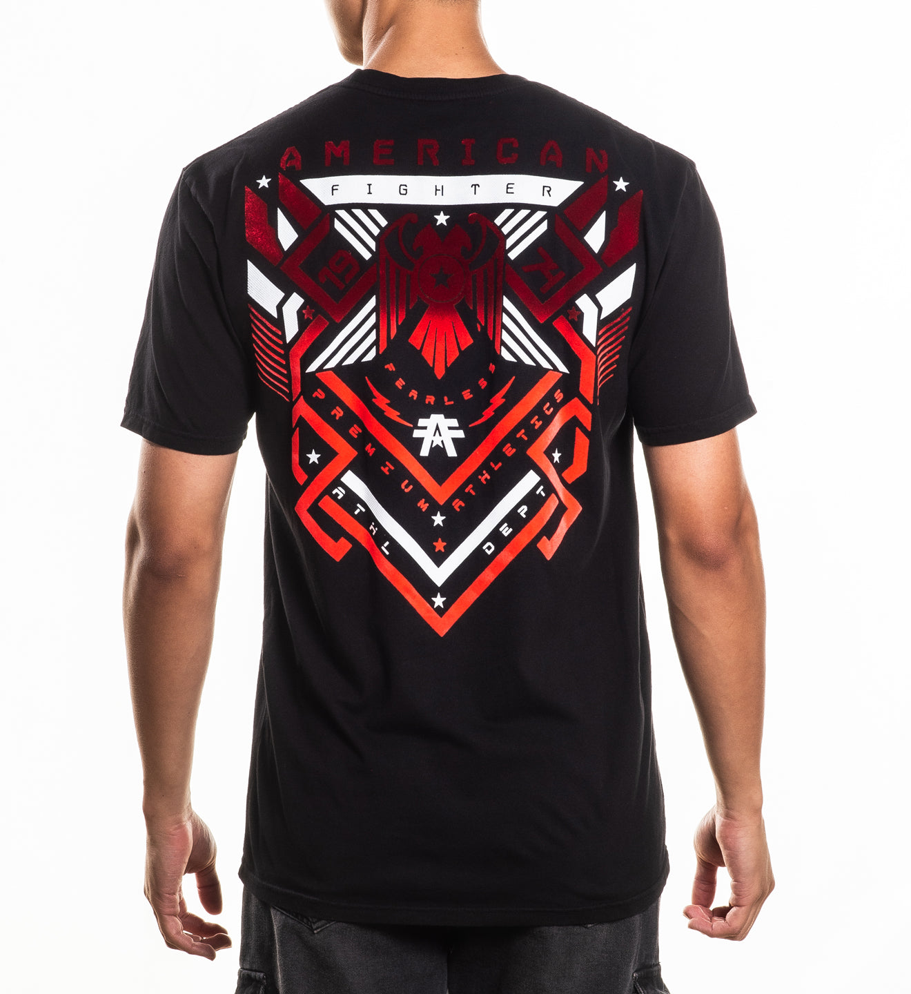 Person wearing a black t-shirt with a red and white graphic design on a white background