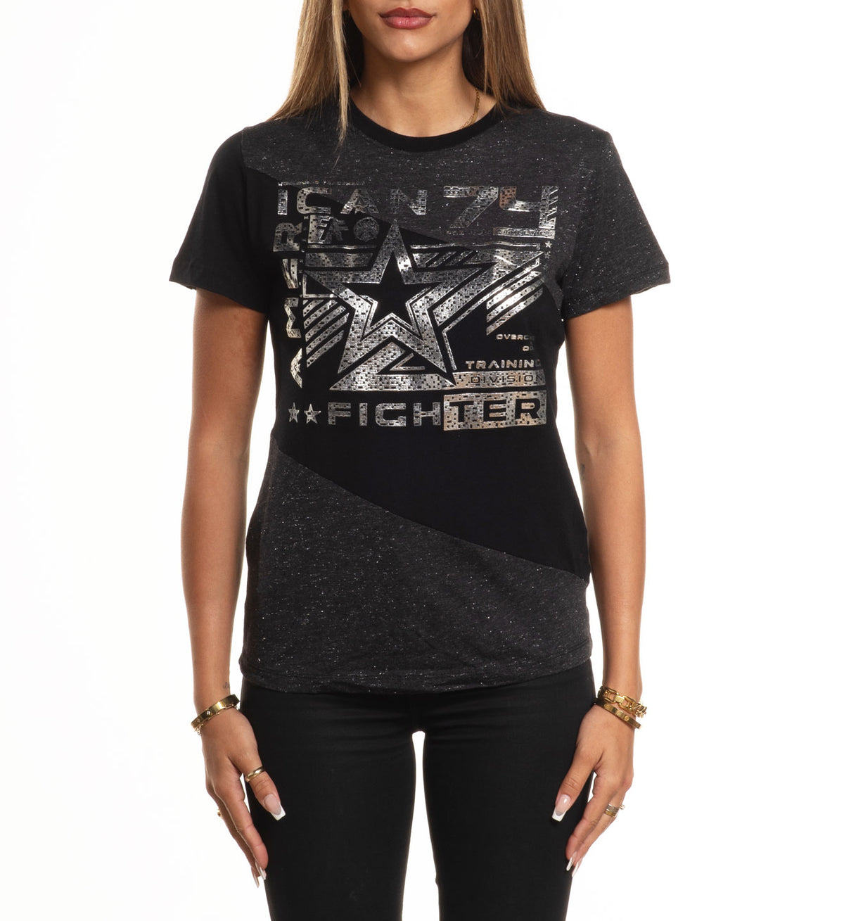 Person wearing a black t-shirt with graphic design on a white background