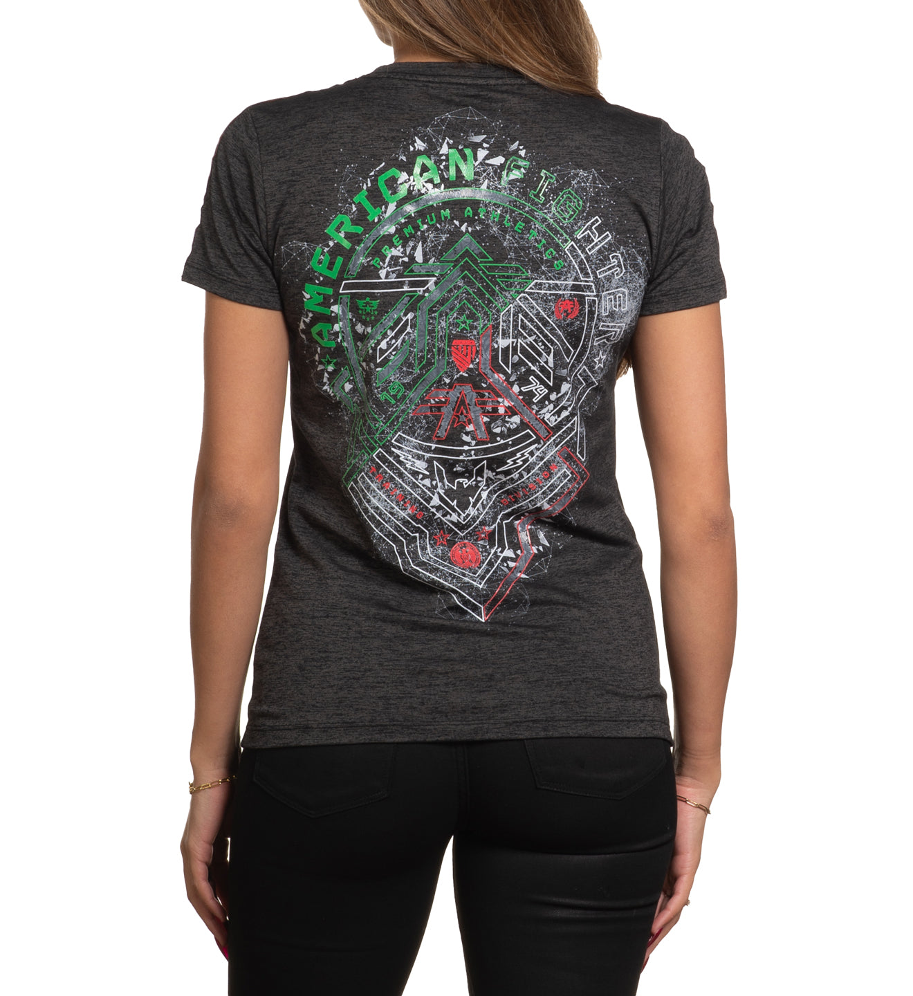 A woman wearing a black short sleeve crew neck t-shirt with a geometric and text design in the center.